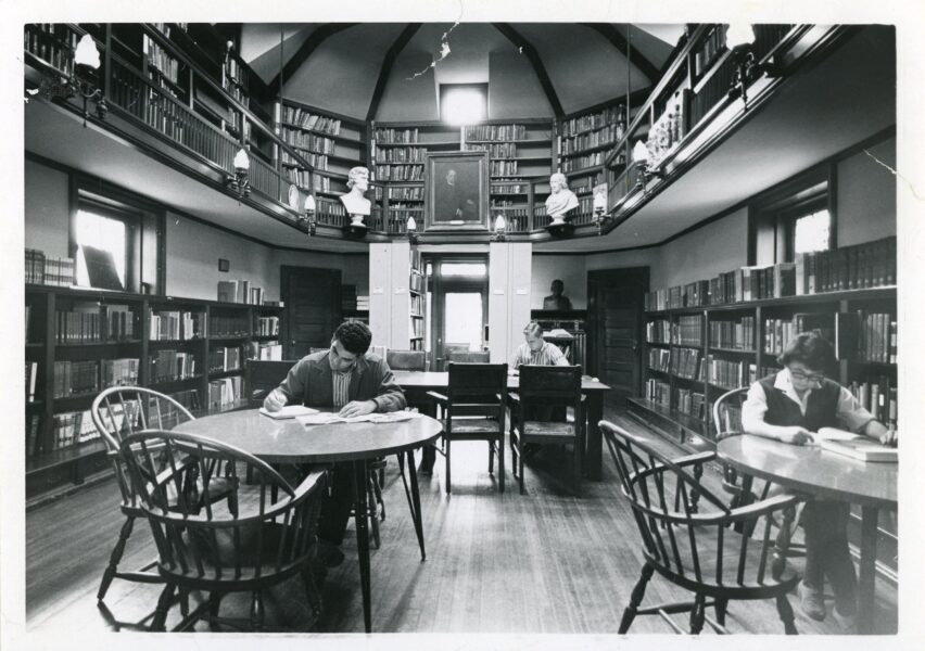 Photograph of students and a woman reading in the Joseph Krauskopf Memorial Library