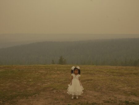 Nanna Heitmann. Siberia. Sayana at a wedding, while the air is covered with smoke from the neighboring wildfires. June 2021.